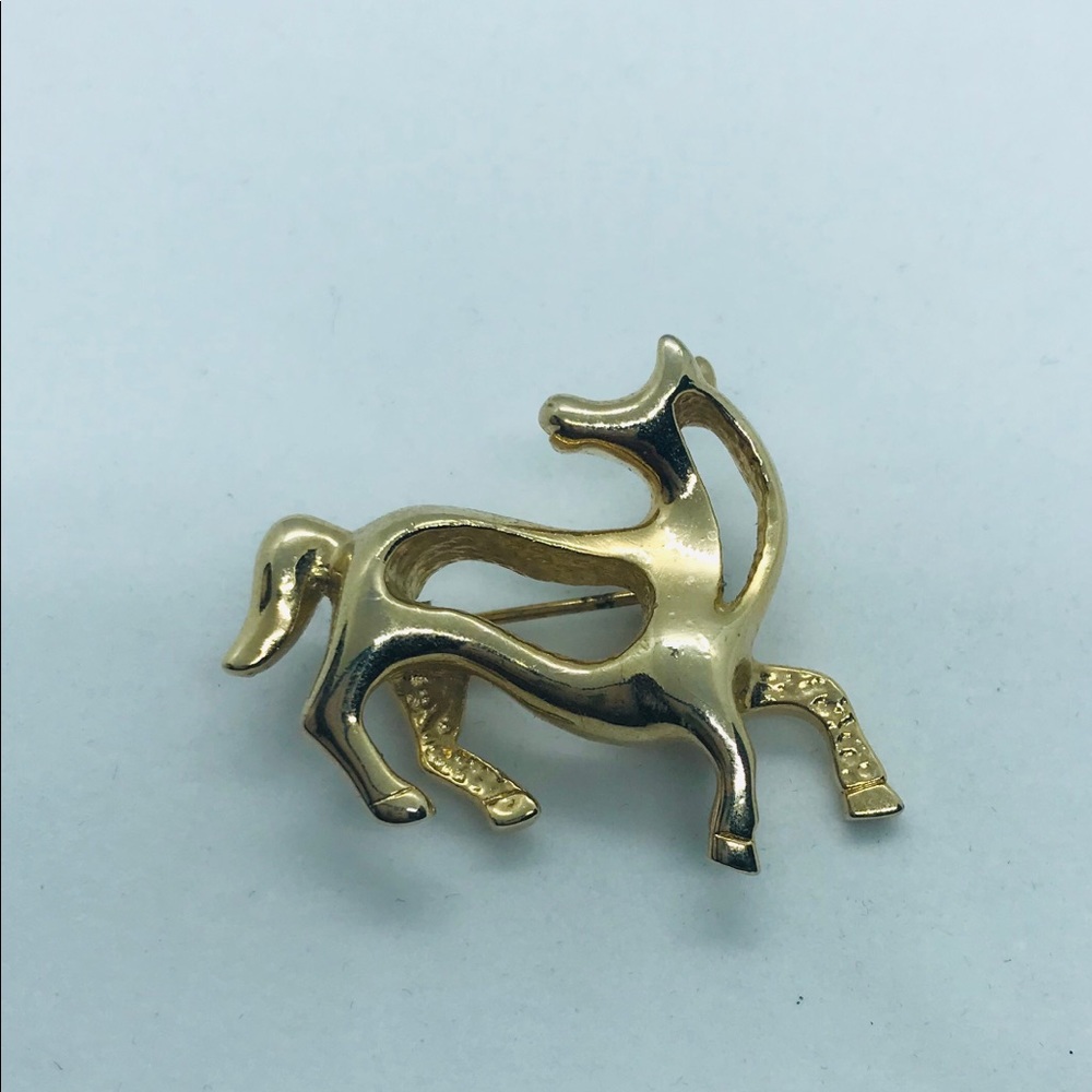 gold tone horse silhouette brooch pin